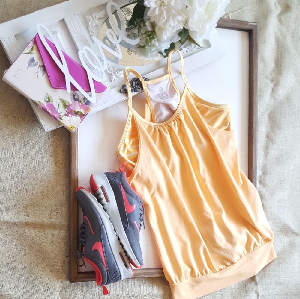 Light tangerine  colored workout top